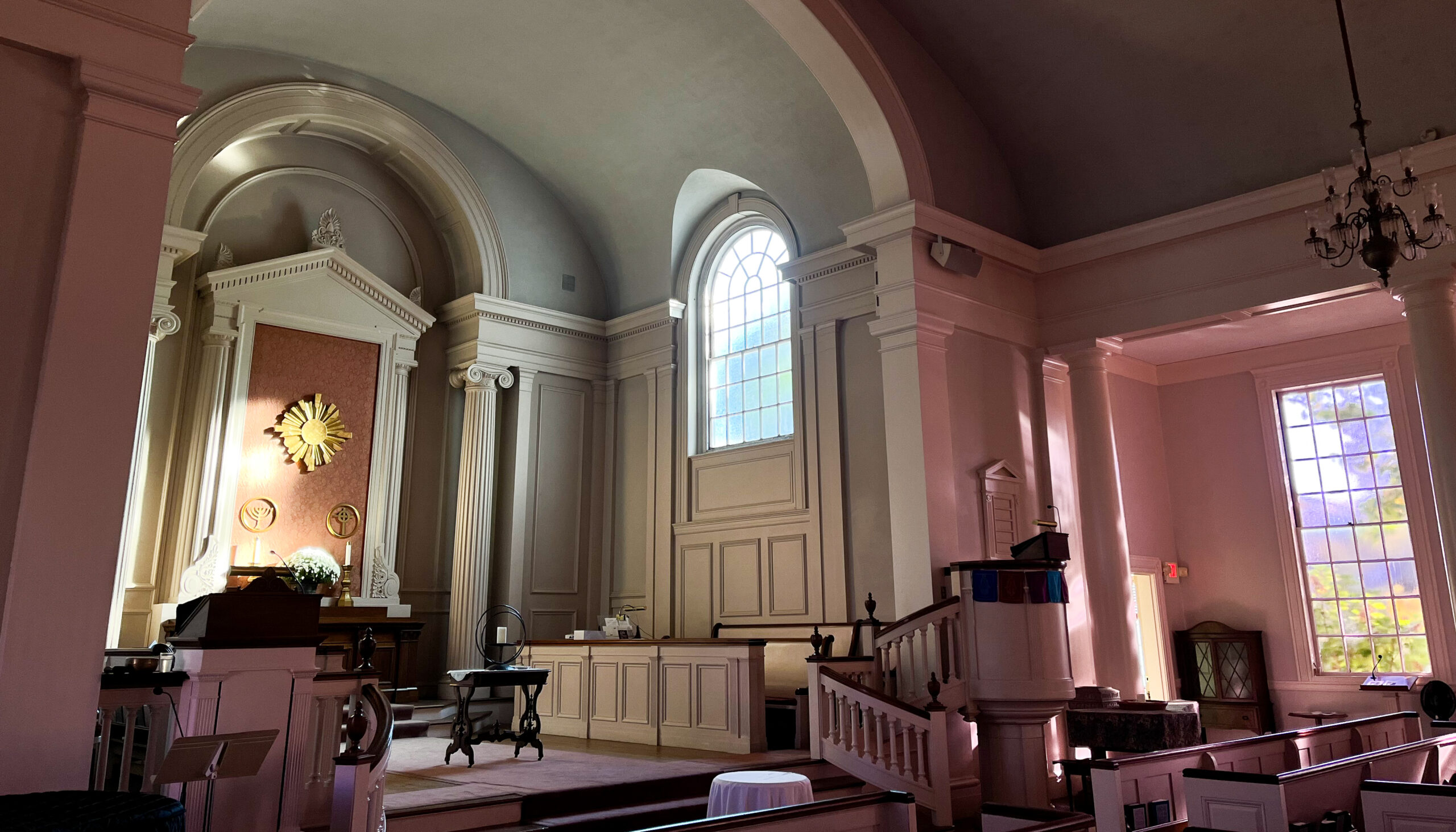 Church sanctuary with sunlight streaming in